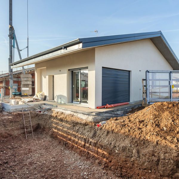 Excavation works for the installation of a swimming pool. Swimming pool under construction.